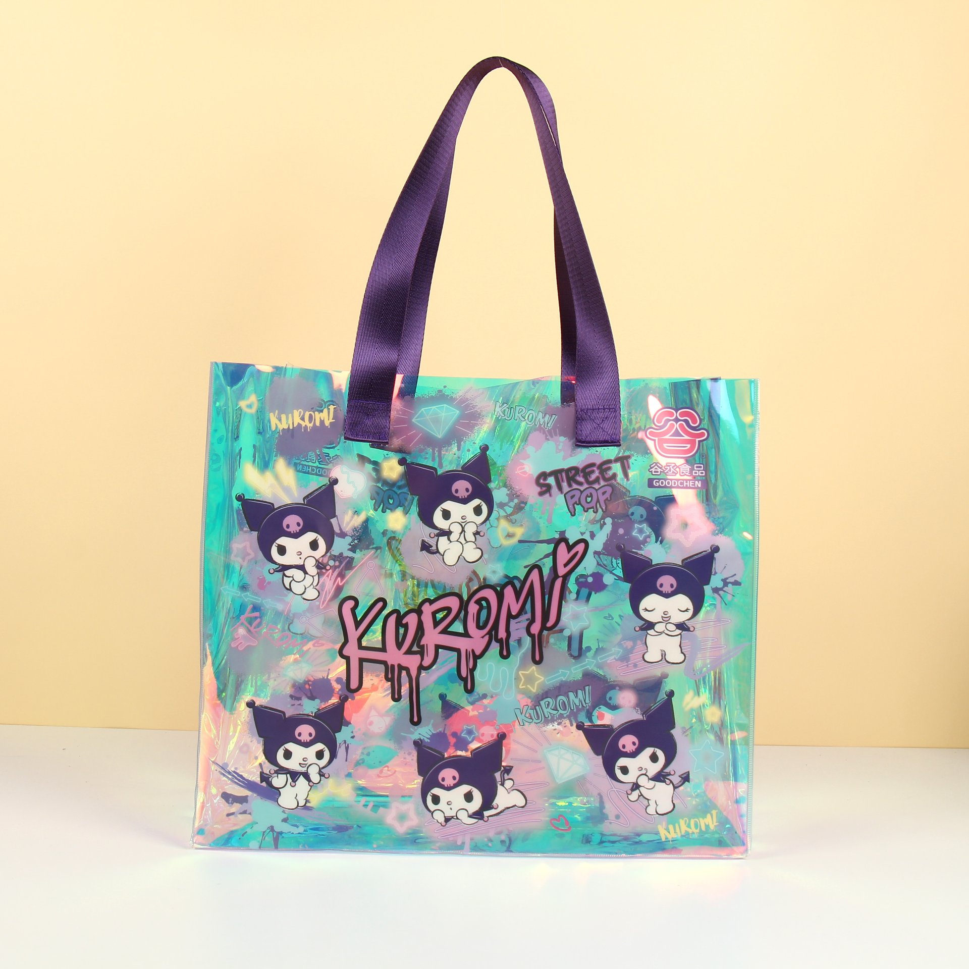 Iridescent PVC tote bag with graffiti cartoon print and purple handles